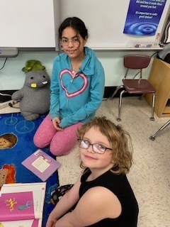 Two students read books