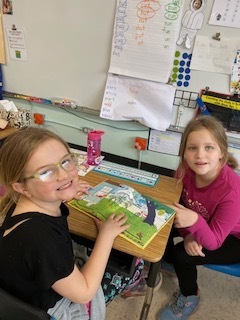 Two students read books