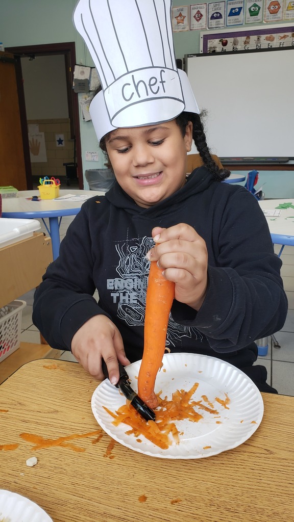 A student peels a carrot